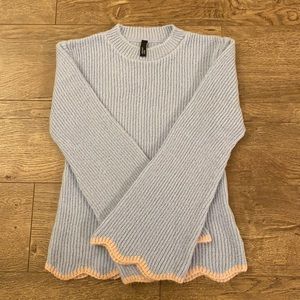 blue and pink bell sleeve sweater